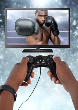 Hands holding gaming controller  with boxer fighter on television Stock Photos