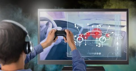 Hands holding gaming controller  with car game on television Stock Photos