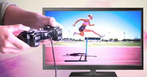 Hands holding gaming controller  with hurdle sports jumper on television Stock Photos