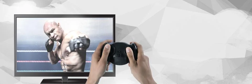 Hands holding gaming controller  with mixed martial arts fighter on television Stock Photos