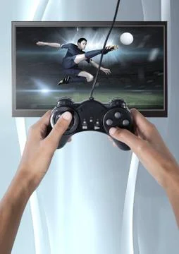Hands holding gaming controller  with soccer player on television Stock Photos