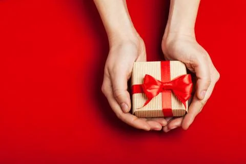 Hands holding a gift Stock Photos