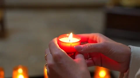 Hands Holding Glowing Devotional Candle, Royal Chapel Versailles France Stock Footage 337053949