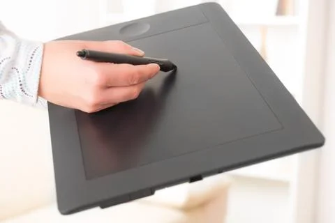 Hands holding graphic tablet Stock Photos