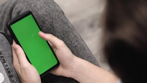 Hands holding green screen phone Stock Footage 246742124