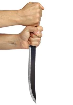 Hands holding a huge murderer knife isolated on white background 스톡 사진