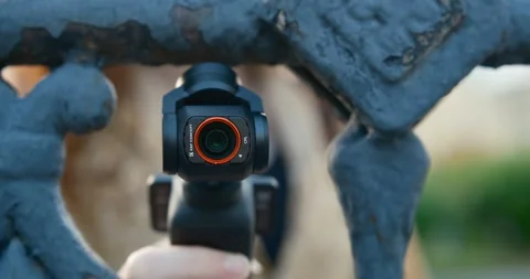 Hands holding a modern DJI Osmo Pocket 库存影片 335987942