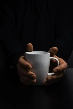 Hands Holding Mug vertical composition Stock Photos