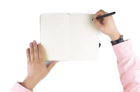 Hands holding note book. Stock Photos