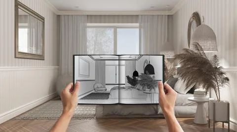 Hands holding notepad with classic bedroom design blueprint sketch or drawing Illustrazione stock