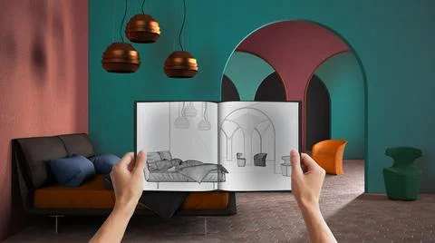 Hands holding notepad with creative bedroom design blueprint sketch or drawin Stock Photos