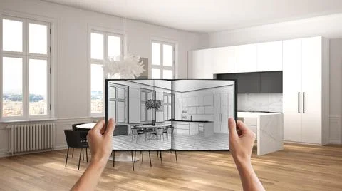 Hands holding notepad with creative kitchen design blueprint sketch or drawin Stock Photos