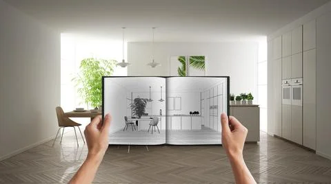 Hands holding notepad with creative kitchen design blueprint sketch or drawin Stock Photos