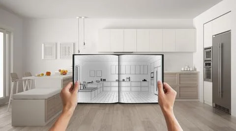 Hands holding notepad with creative kitchen design blueprint sketch or drawin Stock Photos