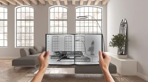Hands holding notepad with creative living design blueprint sketch or drawing Illustrazione stock
