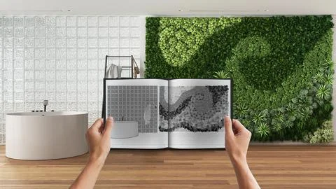 Hands holding notepad with minimal bathroom design blueprint sketch or draw.. Stock Illustration