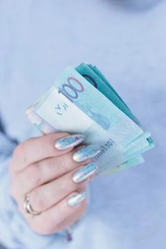 Hands holding paper bills Belarusian rubles 스톡 사진