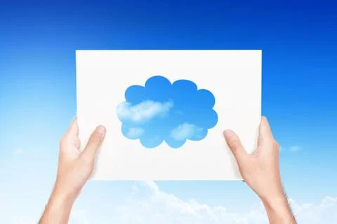 Hands holding the paper with a piece of cloud pattern Stock Photos