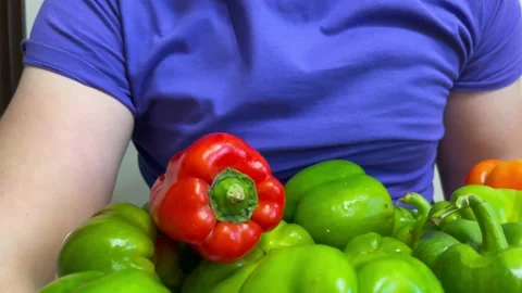 Hands holding a pepper Stock Footage 163155092