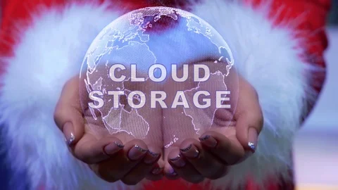 Hands holding planet with text Cloud storage Stock Footage 123679962