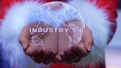 Hands holding planet with text Industry 5.0 Stock Footage 148644242