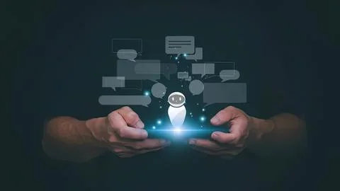 Hands holding a robot with chat bubbles and technology Stock Photos