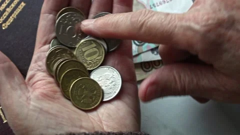 Hands holding russian coins Stock Footage 164720129