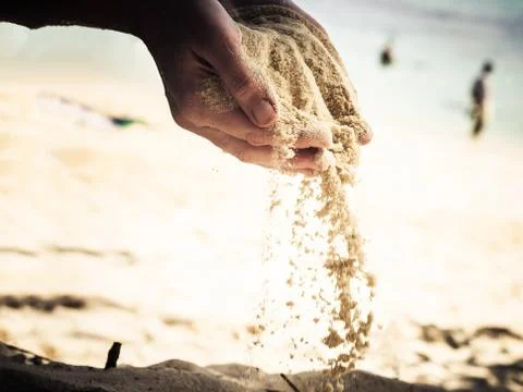Hands holding sand Stock Photos