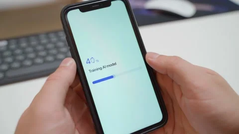 Hands holding smartphone with AI model training failing. Training failed error Vidéo 342940352