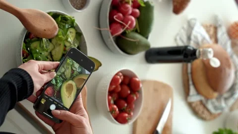Hands holding smartphone and taking pictures for social media in kitchen Stock Footage 190614015