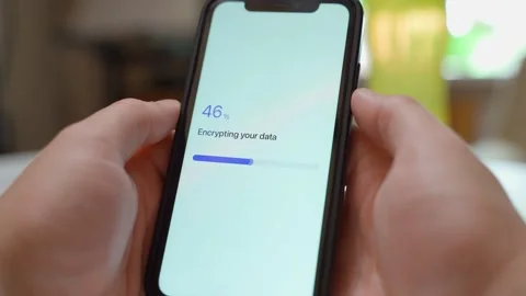 Hands holding smartphone with data encryption failing. Encryption failed error Stock Footage 342940222