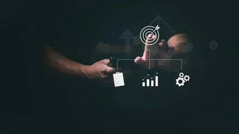 Hands holding smartphone with digital data and target icon Stock Photos