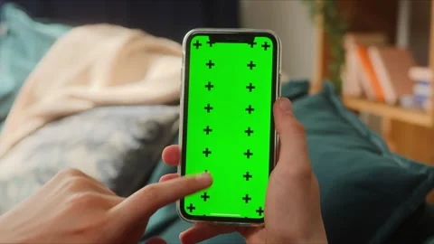 Hands Holding Smartphone with Green Screen – Chroma Key Mockup Stock-Footage 332709547