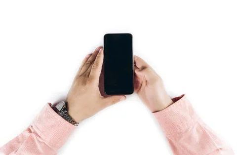 Hands holding smartphone. Stock Photos