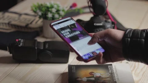 Hands Holding Smartphone Scrolling Through Facebook Feed And Social Media Stock Footage 148987941