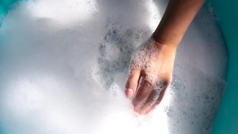 Hands Holding Soap Bubbles in Clean Water, Close-up, Wash hands hygiene Stock Footage 331281579
