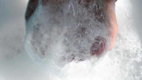 Hands Holding Soap Bubbles in Clean Water, Close-up, Wash hands hygiene Stock Footage 332507559