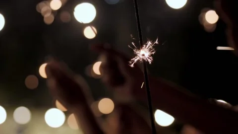 Hands holding Sparkler. Stock Footage 167435955