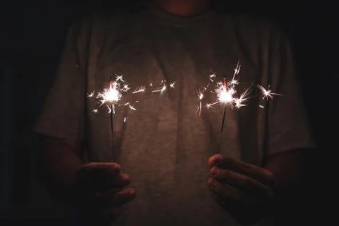 Hands holding sparklers firework Stock Photos