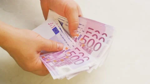 Hands Holding Stack Of 500 Euro Banknotes Stock Footage 139114845
