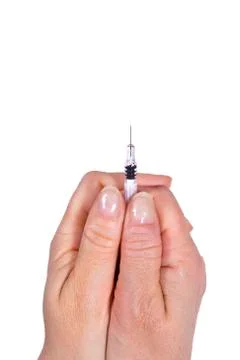 Hands holding suringe Stock Photos