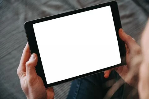 Hands Holding Tablet with Blank Screen Mockup Stock Photos