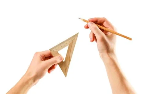Hands holding a triangular ruler and pencil on a white background. Closeup Fotos de archivo