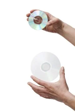 Hands holding two dvd Stock Photos