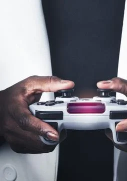 Hands holding video game controller Stock Photos
