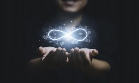 Hands holding virtual infinity with technology icon for symbol of connectio.. Stock Photos