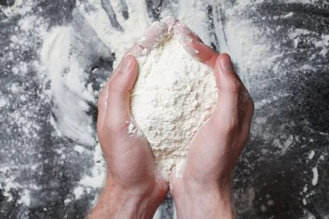 Hands holding wheat Stock Photos
