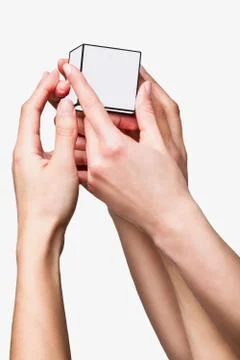 Hands holding white cube Stock Photos