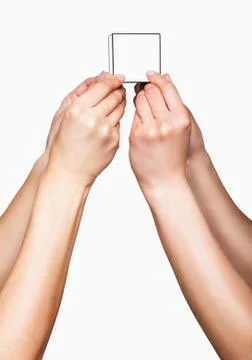 Hands holding white cube Foto stock