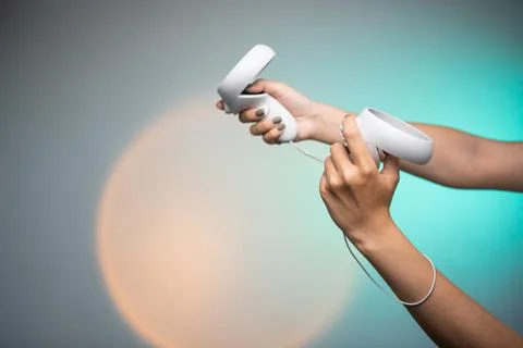 Hands holds vr remote controller, Wireless joystick for next generation video Stock Photos